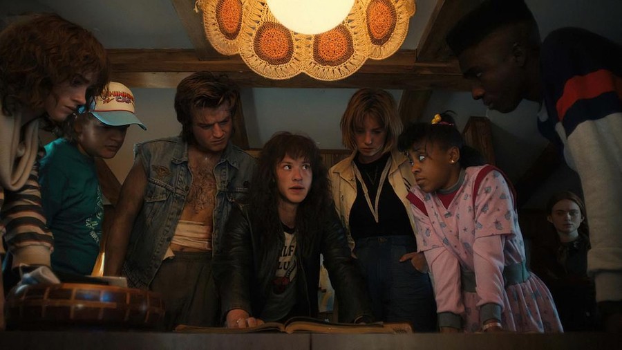 STRANGER THINGS. (L to R) Eduardo Franco as Argyle, Noah Schnapp as Will Byers, Finn Wolfhard as Mike Wheeler, and Charlie Heaton as Jonathan Byers in STRANGER THINGS. Cr. Courtesy of Netflix © 2022