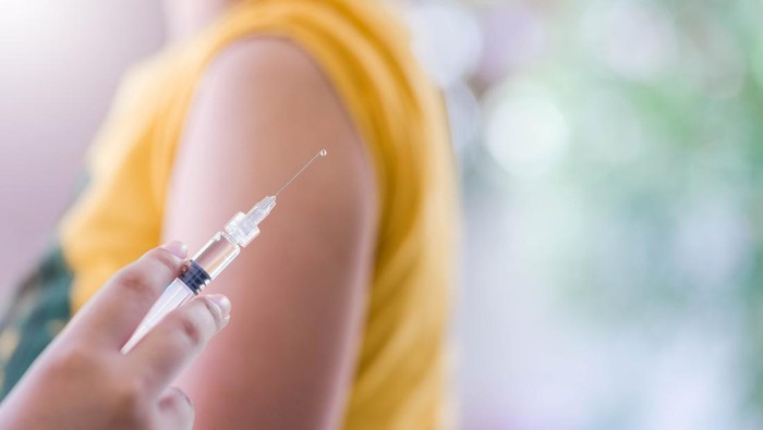 Closeup of doctor hand are vaccinations to patients using the syringe.Medical concept