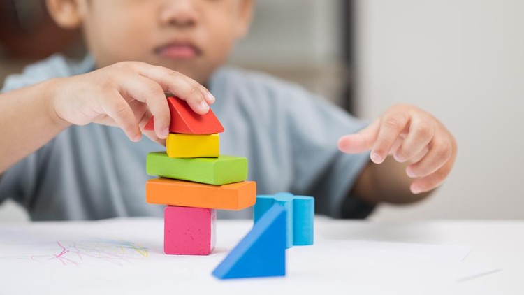 ilustrasi sekolah Close up Children hand Practice the skills of playing with wooden toys on the table in living room. Asian little boy education from home. Developing children's learning before entering kindergarten