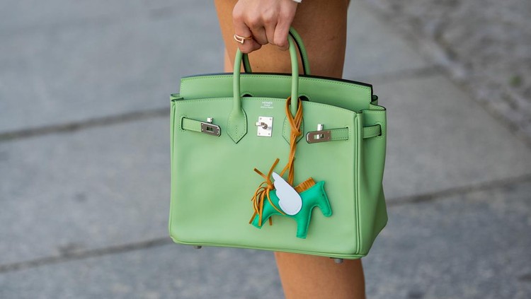 BERLIN, GERMANY - MAY 22: Mandy Bork is seen wearing Pucci shorts, white Zara Shirt, Chanel sandals, green Hermes bag white blazer Vehla Sunglasses on May 22, 2022 in Berlin, Germany. (Photo by Christian Vierig/Getty Images)