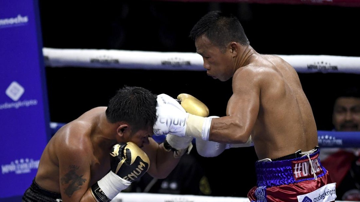 FOTO: Daud Yordan Pertahankan Sabuk WBC Asian Boxing Council Silver