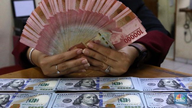 Rupiah Tembus Rp 15.700/US$ Meski Ada Kabar Baik Dari China