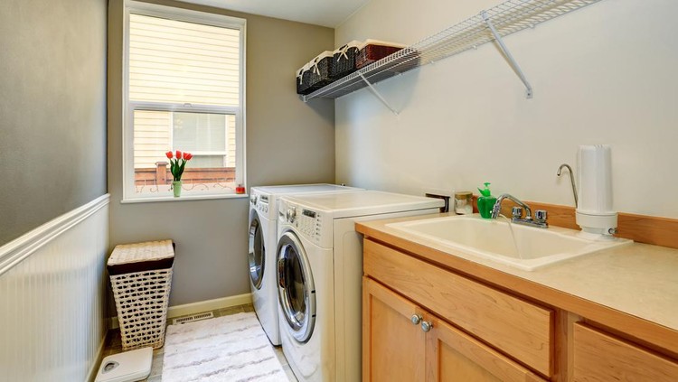 Ilustrasi Laundry Room Laundry room with wood cabinets and tile floor. Northwest, USA