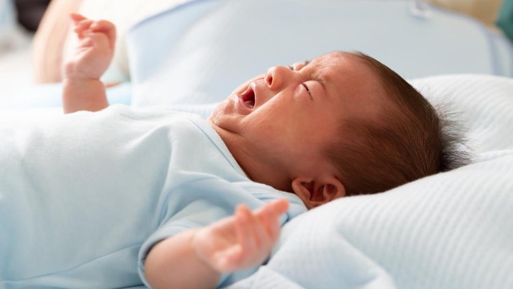 Asian baby newborn crying from diarrhea colic symptoms