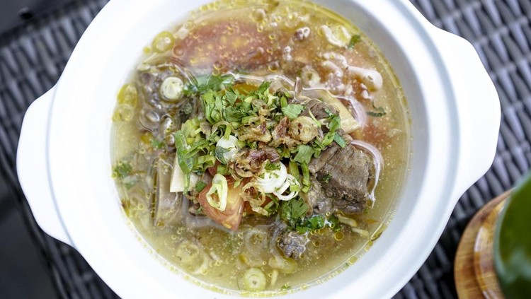 Gulai Kambing or soup Iga. Traditional Javanese mutton curry soup, sop iga sapi, rib beef soup, Indonesian food