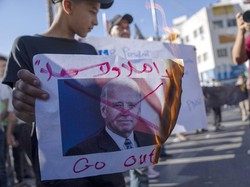 Aksi Protes Ribuan Warga Palestina Tentang Kedatangan Joe Biden
