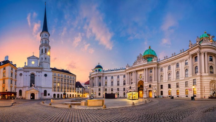 Cityscape image of Vienna, Austria with St. Michael's Square during sunrise.