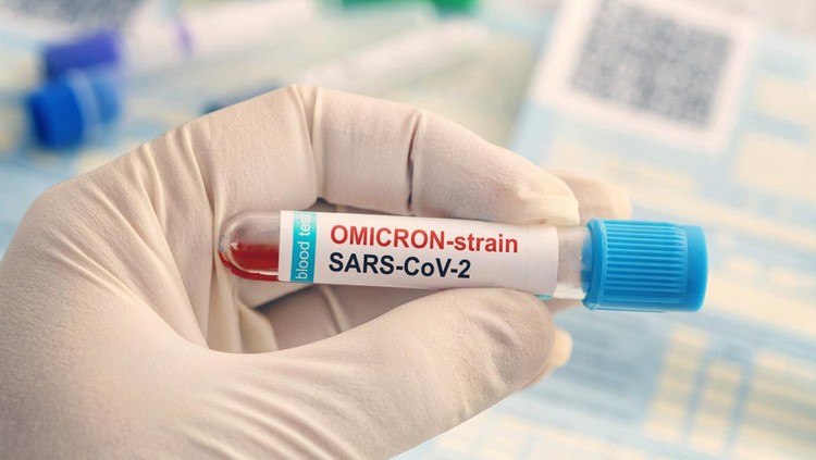 Doctor with a positive blood sample for new variant detected of the coronavirus strain called covid Omicron. Research of new african strains and mutations of the Covid 19 coronavirus in the laboratory