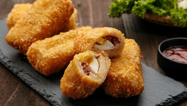 Ilustrasi Resep Risol Mayo Risoles or Risol is a typical Indonesian traditional street food made from flour skin, meat and egg stuffing inside with mayonnaise and chili sauce.