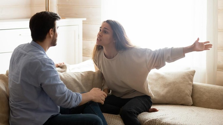 Misunderstanding. Angry worried young spouses quarreling arguing at home, annoyed nervous millennial wife shouting screaming on frustrated husband accusing in cheat threatening with breakup divorce
