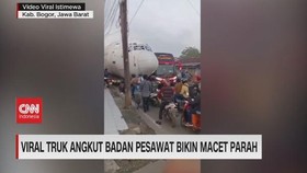 VIDEO: Viral Rombongan Truk Angkut Bangkai Pesawat Bikin Macet Jalan