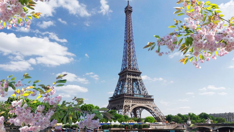 eiffel tour over Seine river waters at spring day, Paris, France