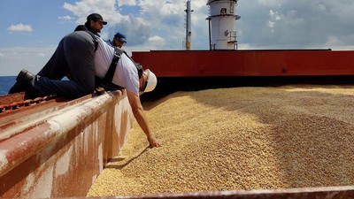 The Joint Coordination Centre officials are seen onboard Sierra Leone-flagged cargo ship Razoni, carrying Ukrainian grain, during an inspection in the Black Sea off Kilyos, near Istanbul, Turkey August 3, 2022. Turkish Defence Ministry/Handout via REUTERS ATTENTION EDITORS - THIS PICTURE WAS PROVIDED BY A THIRD PARTY. NO RESALES. NO ARCHIVES.     TPX IMAGES OF THE DAY