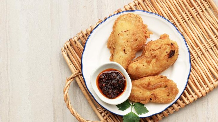 Pisang goreng sambal roa Pisang Goreng Sambal Roa or Fried Banana with Sambal Roa is One of the Typical Culinary Delights from Manado Indonesia, Top View