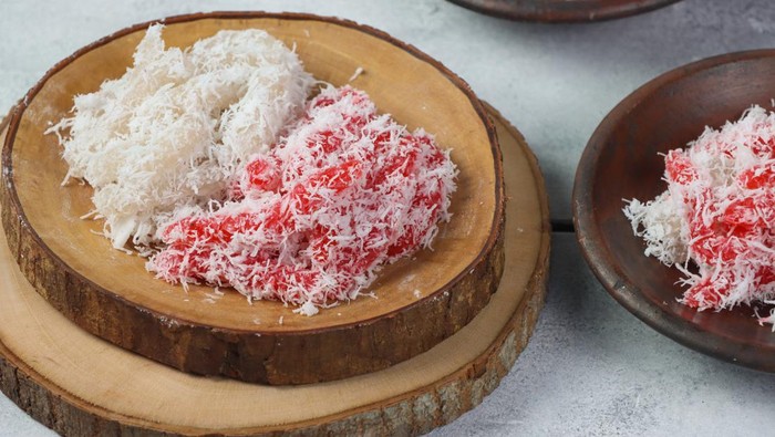 Cenil merah putih, Red and white Cenil, Indonesian traditional snack, made from strach of cassava. These foods can be formed in small rounds. Cenil usually served with grated coconut.