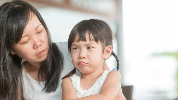 Candid shoot of people in cafeteria. Little girl with various face expression. Asian family outdoor lifestyle with natural light.