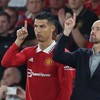 Soccer Football - Premier League - Manchester United v Liverpool - Old Trafford, Manchester, Britain - August 22, 2022 Manchester United's Cristiano Ronaldo with manager Erik ten Hag before coming on as a substitute REUTERS/Phil Noble EDITORIAL USE O