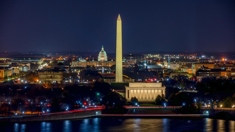 Long Exposure picture of illuminated Washington DC at night with the US. Capitol, Washington Monument and the Lincoln Memorial visible