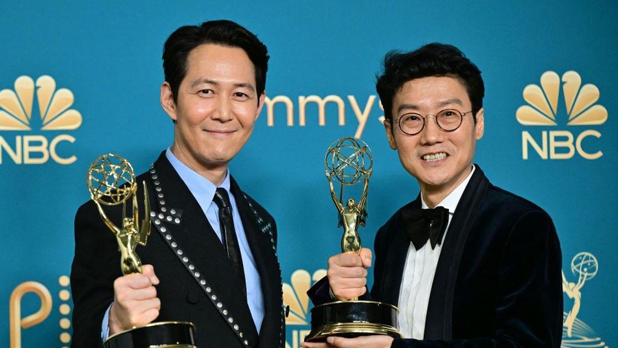 South Korean actor Lee Jung-jae (L) poses with the award for Outstanding Lead Actor In A Drama Series and South Korean director Hwang Dong-hyuk (R) with the Emmy for Outstanding Directing For A Drama Series for 
