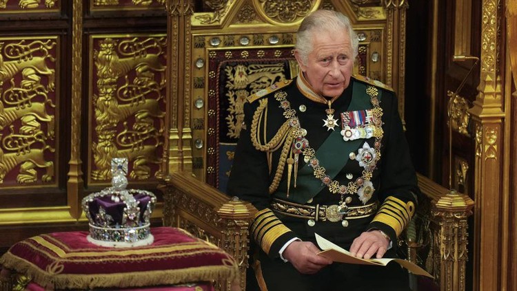 FILE - Prince Charles reads the Queen's speech next to her crown during the State Opening of Parliament, at the Palace of Westminster in London, Tuesday, May 10, 2022. In retrospect, it seems Queen Elizabeth II was preparing us all along for her death. Whether it was due to age, ill health or a sense that the end was near, she spent much of the last two years tying up loose ends, making sure the family firm would keep ticking along. (AP Photo/Alastair Grant, Pool, File)