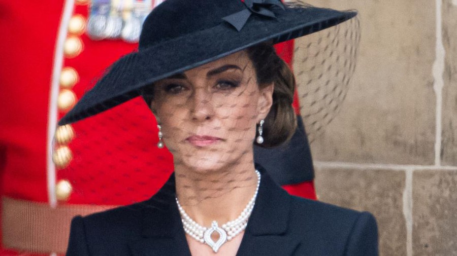 LONDON, ENGLAND - SEPTEMBER 19: Catherine, Princess of Wales is seen in a car during the State Funeral of Queen Elizabeth II at Westminster Abbey on September 19, 2022 in London, England. Elizabeth Alexandra Mary Windsor was born in Bruton Street, Mayfair, London on 21 April 1926. She married Prince Philip in 1947 and ascended the throne of the United Kingdom and Commonwealth on 6 February 1952 after the death of her Father, King George VI. Queen Elizabeth II died at Balmoral Castle in Scotland on September 8, 2022, and is succeeded by her eldest son, King Charles III. (Photo by Sarah Meyssonnier - WPA Pool/Getty Images)