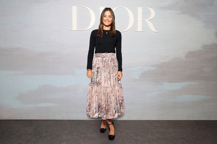 Tennis player Emma Raducanu combined a floral pink blush skirt with a casual black top.  Classy!Photo: Getty Images for Christian Dior/Pascal Le Segretain