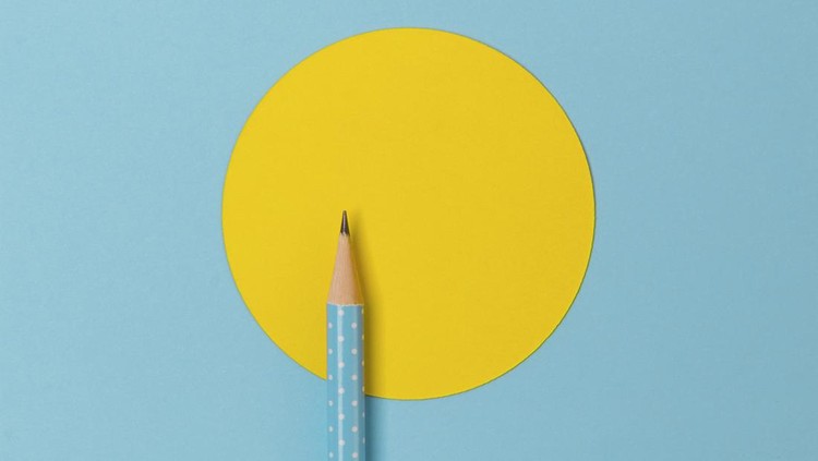 Top view of turquoise polka dot pencil on colorful paper combine with yellow circle. Minimalist template with copy space.
