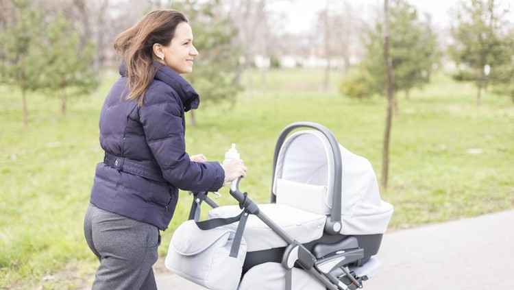 Pushing Baby Stroller