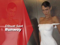 Bella Hadid Tampil Memukau Pakai Gaun Semprot di Paris Fashion Week