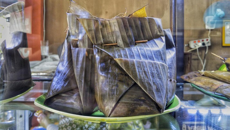 Botok, a traditional Indonesian Javanese food made from coconut, chili, salt, pepper, bay leaf, Chinese petai, tofu, anchovies and shrimp.