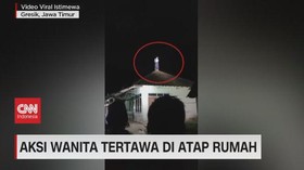 VIDEO: Aksi Wanita Tertawa di Atap Rumah
