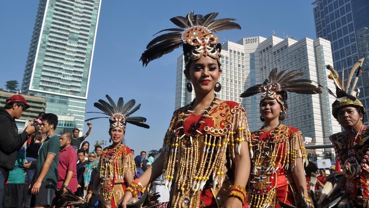 Jakarta, Indonesia - August 27, 2017: Dayak Borneo Culture participated in ASEAN Culture Parade in Thamrin - Sudirman Street, Jakarta-Indonesia