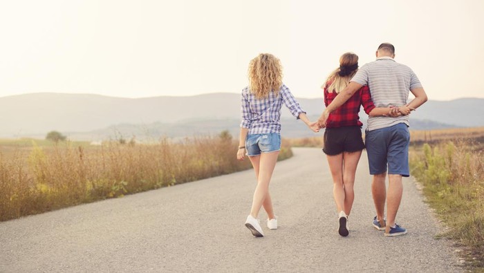 'Love triangle' concept. One man with two woman.