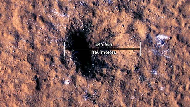 Meteorite collision triggers M 4 earthquake on Mars, launches ice cubes