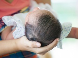 Mengenal Ngebuyu, Tradisi Menyambut Kelahiran Bayi di Lampung
