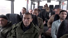 A still image from video, released by the Russia's Defence Ministry, shows what it said to be captured Russian service personnel during the latest exchange of prisoners of war at an unknown location in the course of Russia-Ukraine conflict, in this i