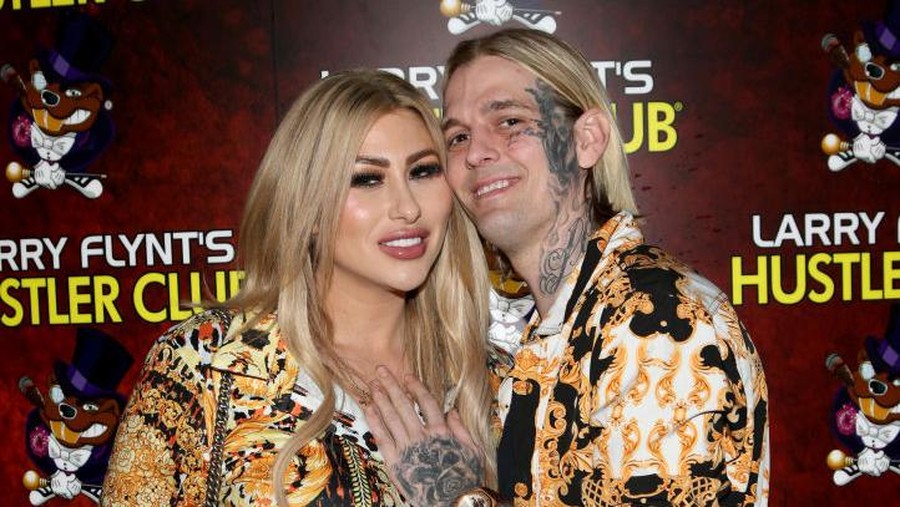LAS VEGAS, NEVADA - FEBRUARY 12: Model Melanie Martin 

 (L) and her fiance, singer and producer Aaron Carter, arrive at Larry Flynt's Hustler Club on February 12, 2022 in Las Vegas, Nevada. (Photo by Gabe Ginsberg/Getty Images)