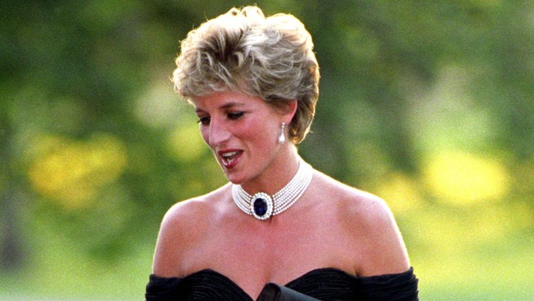 Diana, Princess of Wales wearing a black pleated chiffon dress, with floating side panel, by Christina Stamboulian, during a party given at the Serpentine Gallery in London.   (Photo by Martin Keene - PA Images/PA Images via Getty Images)