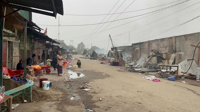 Polisi usut kasus perusakan kendaraan dan penjarahan kios milik warga oleh sekelompok masyarakat di jalan Trans Nabire-Enarotali, Papua.