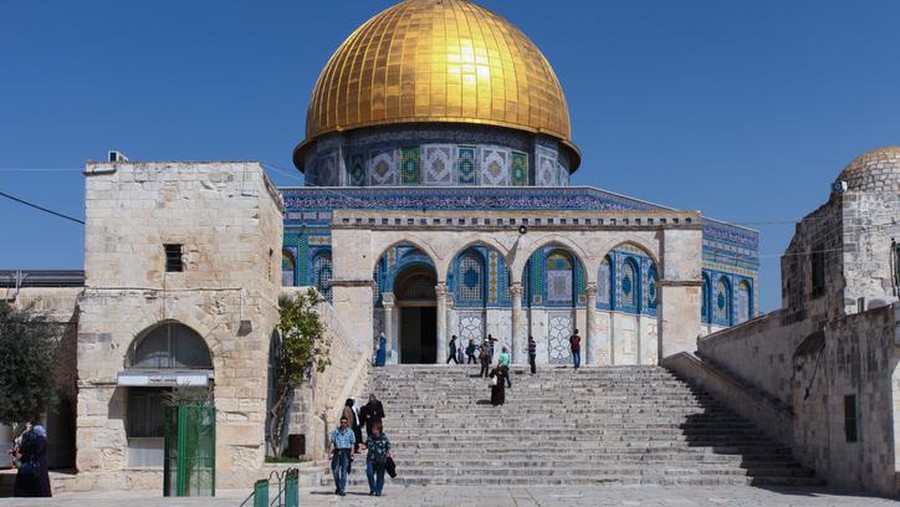 Arched South gateway with Siliver dome of Al-Aqsa Mosque at the square of Golden Dome of the Rock, in an Islamic shrine located on the Temple Mount in the Old City Jerusalem, Israel
