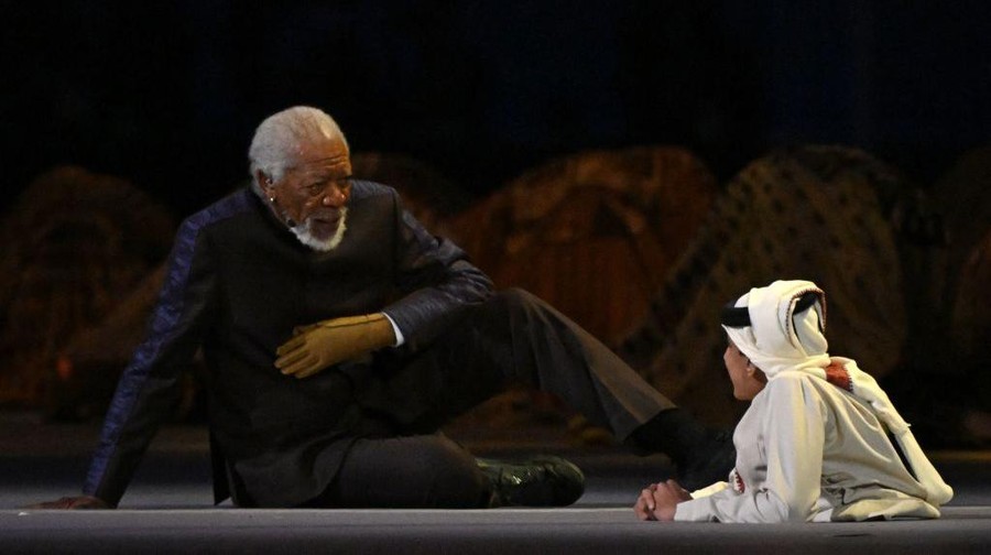 Ghanim Muftah US actor Morgan Freeman (L) and Qatari YouTuber Ghanim al Muftah speak during the opening ceremony ahead of the Qatar 2022 World Cup Group A football match between Qatar and Ecuador at the Al-Bayt Stadium in Al Khor, north of Doha on November 20, 2022. (Photo by Odd ANDERSEN / AFP) (Photo by ODD ANDERSEN/AFP via Getty Images)
