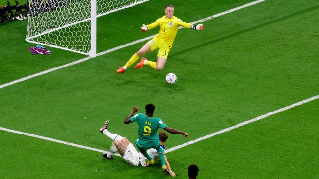 Inggris harus berterima kasih kepada Jordan Pickford yang melakukan penyelamatan penting satu tangan sebelum membantai Senegal 3-0 di 16 besar Piala Dunia 2022.