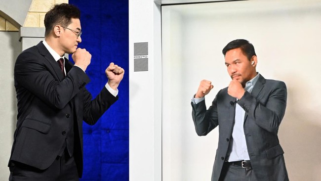 Manny Pacquiao menang angka mutlak atas DK Yoo dalam duel tinju ekshibisi di Korea International Exhibition Center, Goyang, Minggu (11/12).
