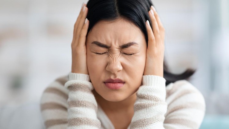 Emotional Asian Woman Covering Ears With Hands At Home, Annoyed Millennial Korean Lady Suffering Stress Or Headache, Can Not Bear Sound, Feeling Desperate And Having Nervous Breakdown, Closeup Shot