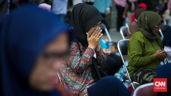 FOTO: Aksi Massal Membasuh Kaki Ibu di Jakarta