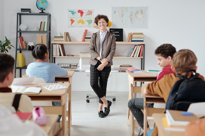 Ilustrasi guru dan murid/Foto: Pexels/Max Fischer