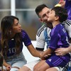 Soccer Football - FIFA World Cup Qatar 2022 - Final - Argentina v France - Lusail Stadium, Lusail, Qatar - December 18, 2022 Argentina's Lionel Messi sits with his wife Antonela Roccuzzo and sons Ciro, Mateo and Thiago after winning the World Cup REU