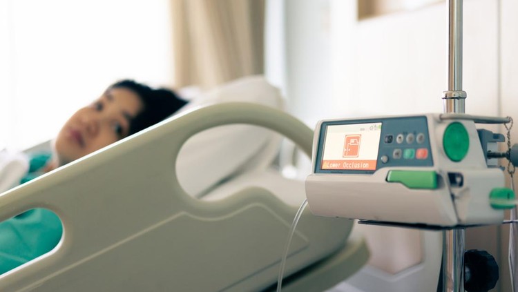 Iv infusion pump alarm sound for occlusion in hospital.