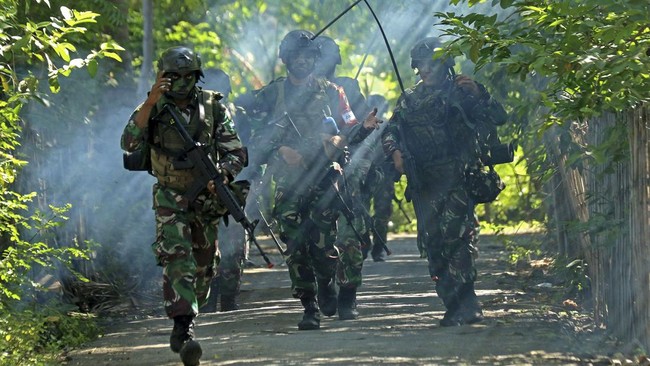 Polisi Militer Kodam (Pomdam) 1 Bukit Barisan menetapkan 25 prajurit TNI AD tersangka kasus penyerangan warga di Deli Serdang.