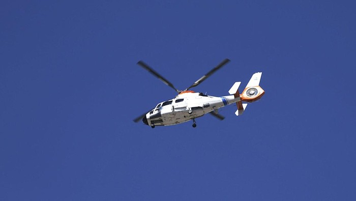 BBUENOS AIRES, ARGENTINA - DECEMBER 20: Players of the world champion Argentina national team tour the city by helicopter in front of thousands of Argentines who took to the streets to celebrate their country's third world cup, in Buenos Aires, Argentina, on December 20, 2022. (Photo by Mariano Gabriel Sanchez/Anadolu Agency via Getty Images)
